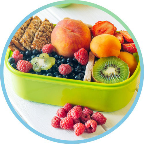 Omni Family Health Fruits and Grain Crackers in a Green Tupperware