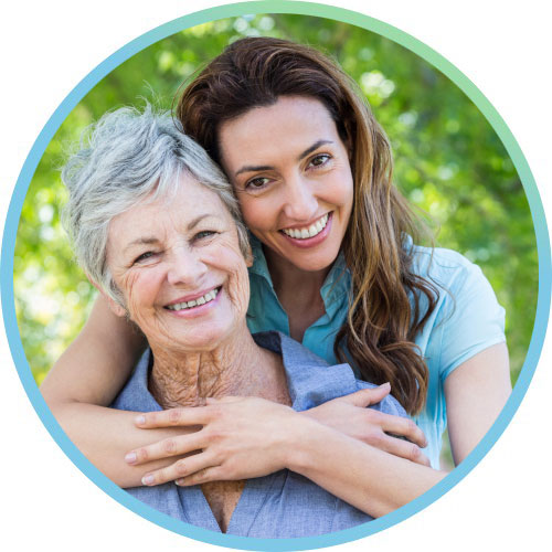 Omni Family Health Older Mother and Daugther smiling at Park womens health services every age