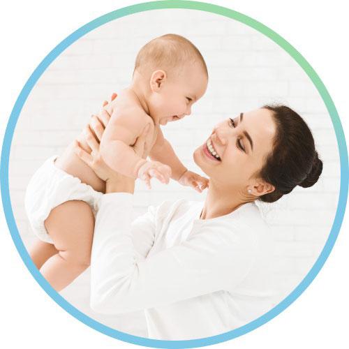 Happy Family. Laughing Mother Lifting Her Adorable Newborn Baby Son - womens health services moms and babies