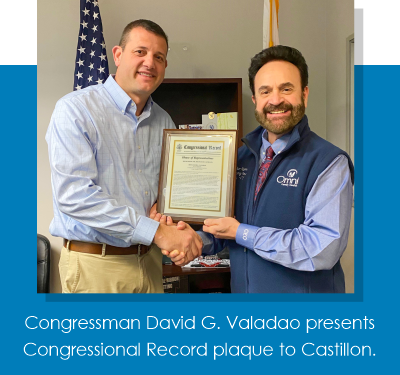 Congressman David G. Valadao presents Congressional Record plaque to Castillon.